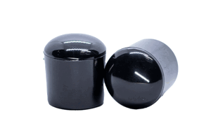 Side view of two black glossy LDPE straight-sided chair feet with a curved base.