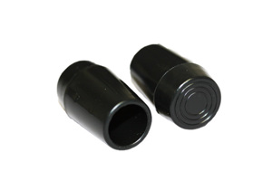 Angled view of two black LDPE heavy duty chair feet with slightly flared bases.