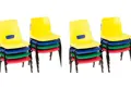 Mulitple colours of stacked primary school chairs.
