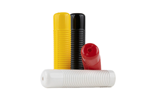 Angled side view of four industrial handle-grips with lots of ribs. They are yellow, black, white and red. Two upright and two on their side.