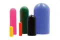 Front view of six round silicone caps in various sizes and colours, including yellow, red, pink, green, black, and blue.