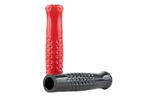 Side view of two shiny plastic grips with lots of dimples. One red one standing up and one black one on its side.