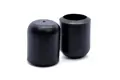 Side view of two black straight-sided rubber injection moulded chair feet. One facing up, one facing down.