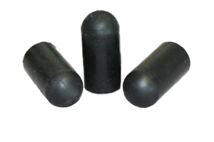 Side-by-side view of three round, black, hi-temp EPDM injection moulded protective caps—one upright and two on their sides pointing towards each other.