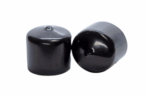 Side-by-side view of two round, black, flexible PVC dip moulded protective caps—one upright and one tilted to display the closed end surface.
