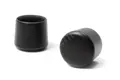 Black plastic ferrules from school PE furniture