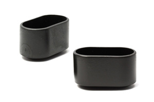 Side view of two black oval LDPE injection moulded chair feet with slightly curved bases.