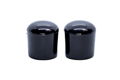 Side-by-side view of two black glossy LDPE straight-sided injection moulded chair feet with a curved base.