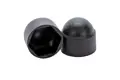 Side-by-side view of two domed, black, plastic nut caps—one upright and one tilted to display the hexagonal open end.