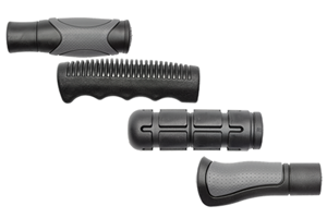 Side view of four black rubber injection moulded grips in varied ergonomic designs, including textured panels, finger grooves, and segmented or contoured surfaces.