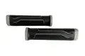 Side-by-side view of two black and grey injection moulded rubber grips with parallel lines running length ways and a textured finish.