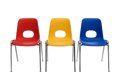 Primary school chairs in a line, red yellow and blue.