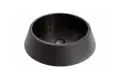 Angled view of an injection moulded black heavy duty plastic furniture carpet castor cup.