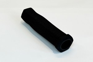 Diagonal view of a black high density foam extrusion moulded grip-sleeve with a plastic end cap.